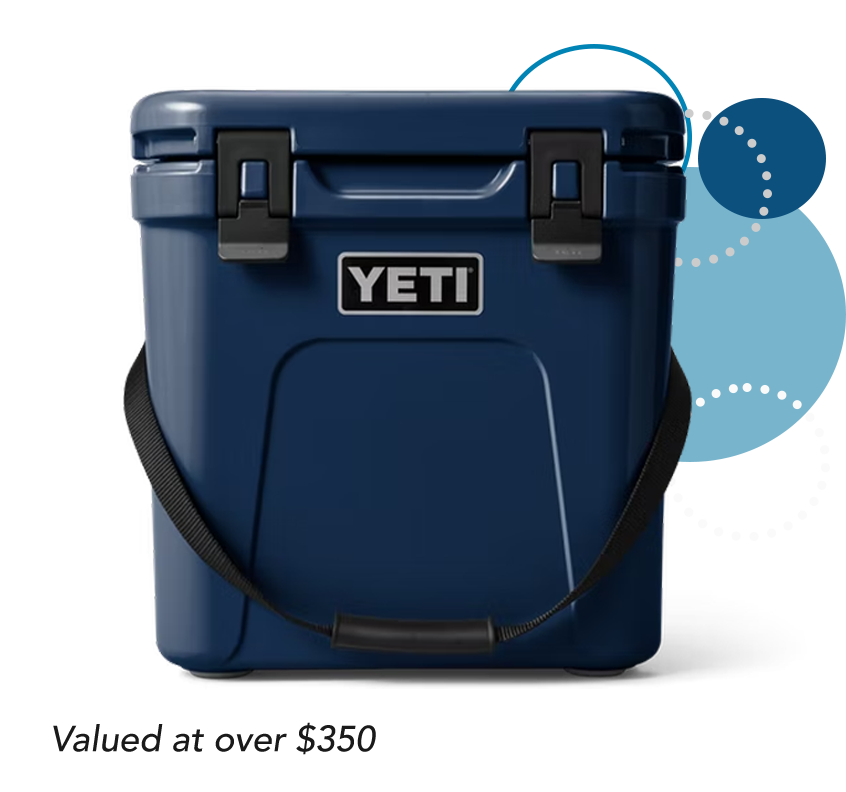 Dark blue YETI brand hard cooler with black carrying strap valued at over $350