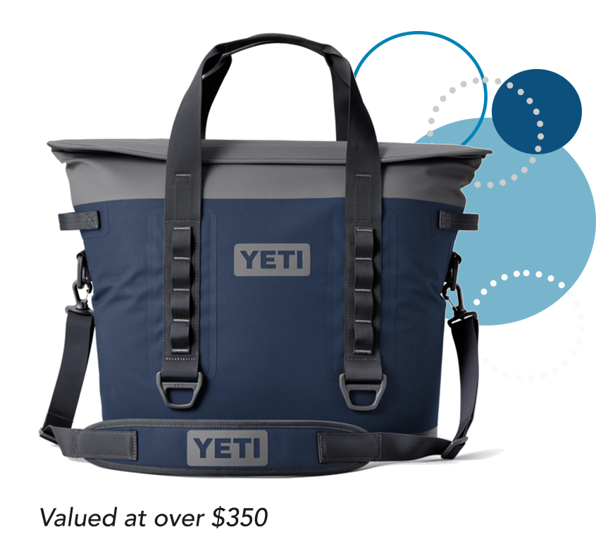 Dark blue YETI brand hard cooler with black carrying strap valued at over $400